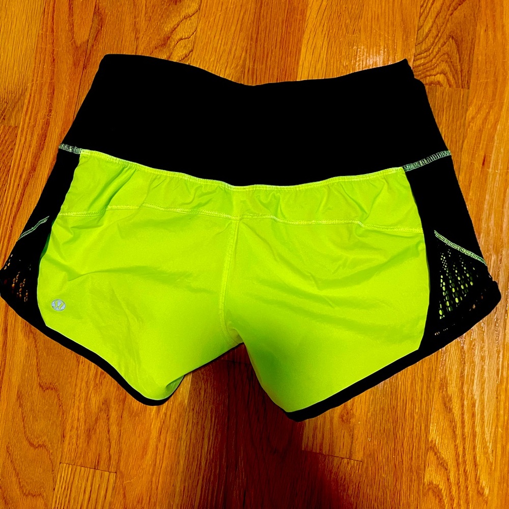 Lululemon shorts. The shorts are the fluorescent color in the first picture.